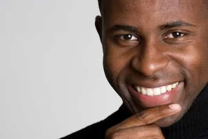 close up of man smiling with perfect teeth