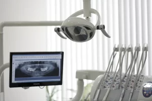 dentist office with xray on screen