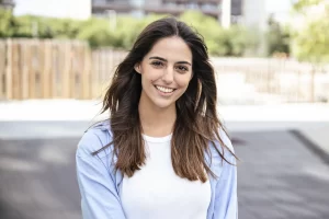 woman outside smiling