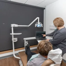 patient in dentist exam room